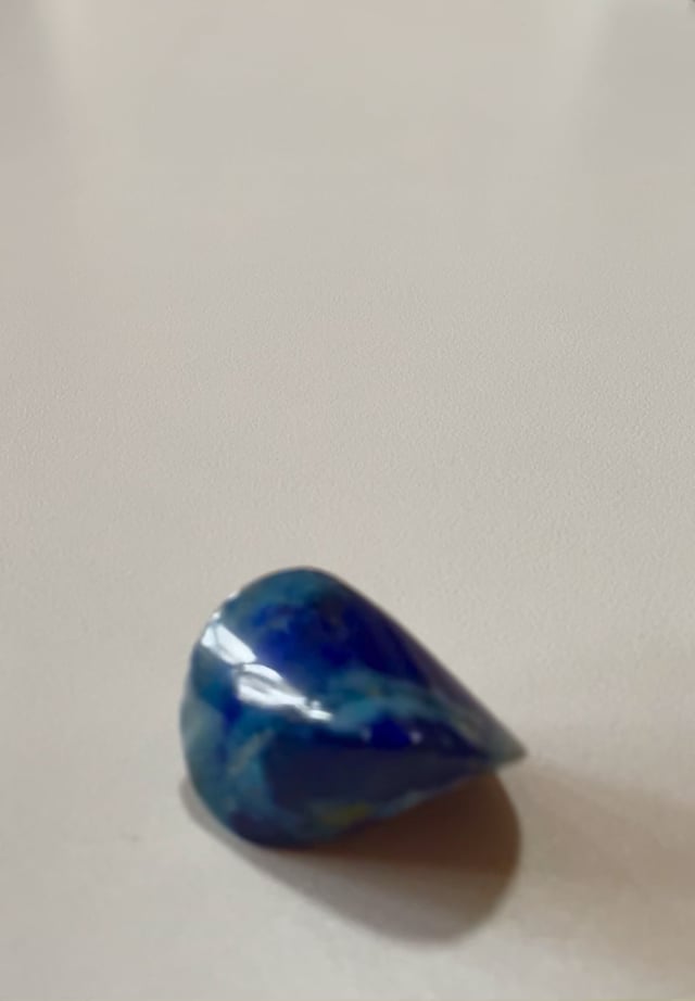 Gemstone Oloid Display of 16 2 3318 lapis oloid movie